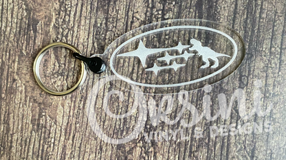 * T-Rex & Stars - Oval Clear Acrylic Keychain